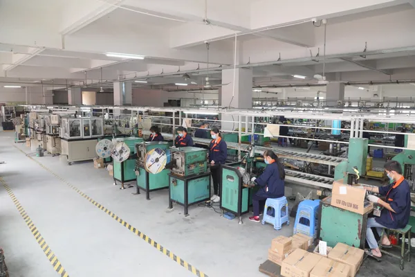 Production hall with winding and assembly stations