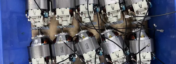 Universal motors after run testing, marked PASSED